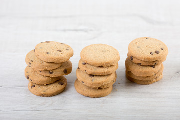 Chocolate cookies on wooden table. 