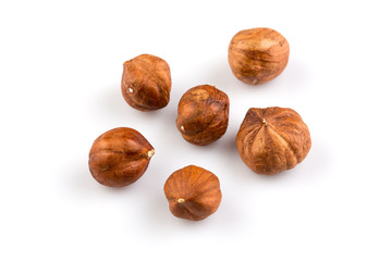 Hazelnuts on the white background