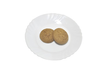 oatmeal cookies on white plate isolated