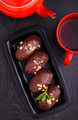potato cake on the plate on a black background. Russian kitchen.