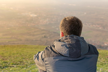 Man on hiking enjoying the view