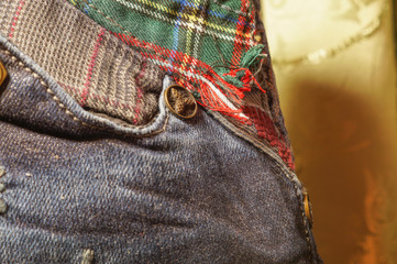 Jeans pocket with insert of fabric, patterns red thread