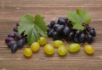 Grapes on wooden background