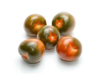 kumato tomatoes isolated on white background