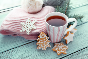 Beautiful winter composition with cup of hot drink, close up