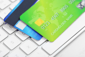 Credit cards on keyboard, close up