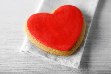 Valentine heart cookie on wooden background
