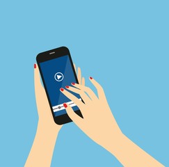 Women Hands holds smartphone. Video player application on your smartphone screen. Watching videos on the smartphone . Mobile video streaming technologies. Watching Video.