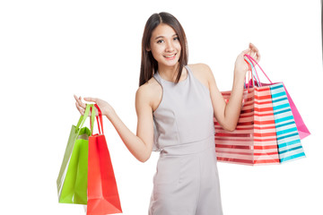 Beautiful young Asian woman with shopping bags