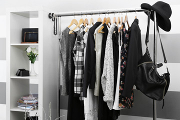 Female clothes on hangers in a room