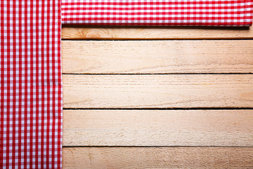 Checkered napkin on wooden background