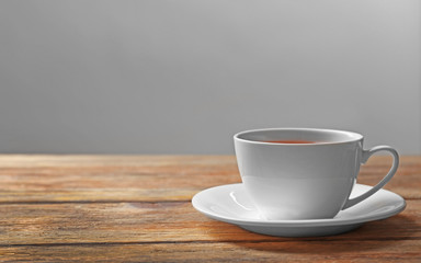 Cup of tea on wooden table