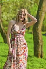 Portrait of Happy Smiling Sensual Blond Woman in Spring Forest Outdoors