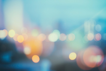 abstract background with bokeh defocused lights and shadow from cityscape at night, vintage or...