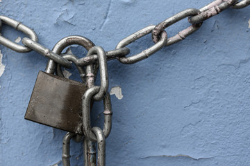 Vignette old key and rusty chain. Vignette lock key and chain.