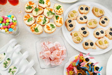 Set of cold snacks, canape and dessert, closeup