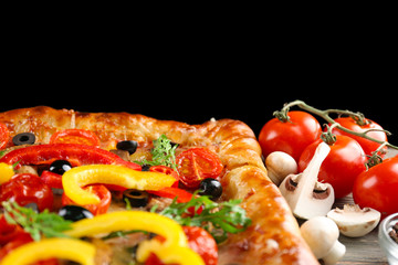 Freshly homemade pizza on black background