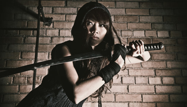 Oriental woman with a katana
