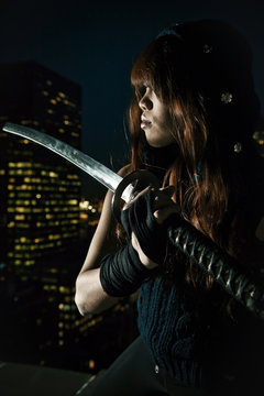 Oriental woman with a katana