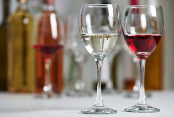 Wine glasses with red and white wine, closeup