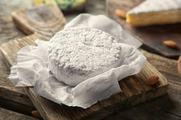 Set of cheese on wooden background