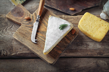 Set of dairy products on wooden table closeup