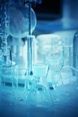 Laboratory glassware on table closeup