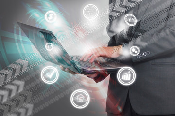 Businessman working with laptop.