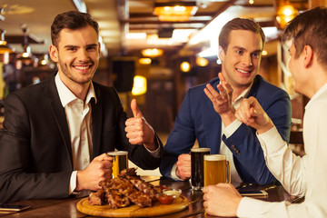 Businessmen in pub