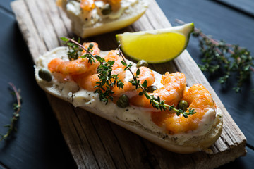 Sandwich with cream cheese, shrimp and herbs