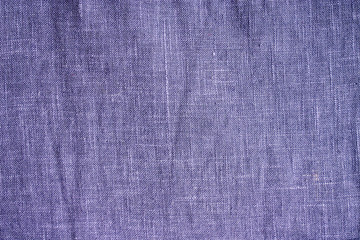 texture of a piece of coarse cloth purple