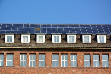 Fototapeta premium Solar energy panels on roof of house