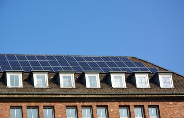 Fototapeta premium Solar energy panels on roof of house
