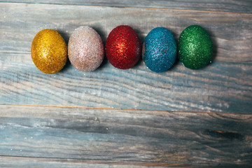 Easter eggs on wooden background