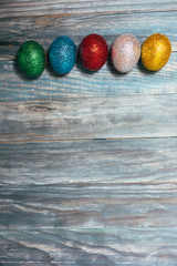 Easter eggs on wooden background