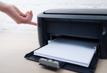 press the button to enable or disable  printer