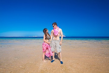 man and woman  at the sea