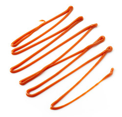 Caramel sauce on white background