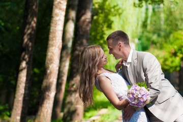 blond bride  and  groom  in  nature