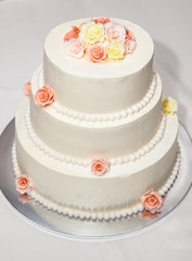 Fototapeta na wymiar wedding cake from white chocolate