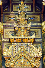 Golden Thai style line art at Temple in Chiang Mai, northern Thailand.