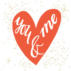 'You and me' hand lettering in a heart shape.