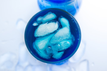 Ice and water in glass