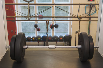 Fototapeta na wymiar Interior of a fitness center with sport equipment
