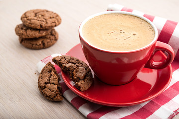 Cup of cappuccino with cookies