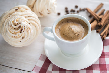 Coffee cup and cake
