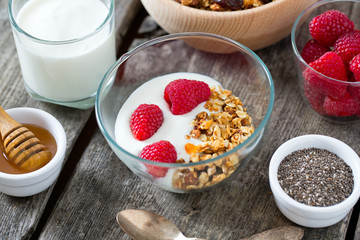 healthy snack - granola on wooden surface