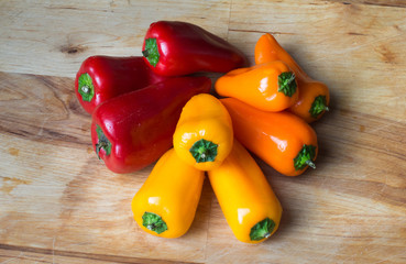mini paprika on a wooden table