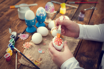 Easter decoration , decoupage Easter eggs on rustic wooden background