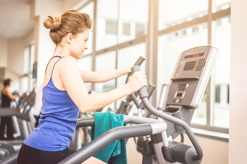Fototapeta premium Woman training in a gym